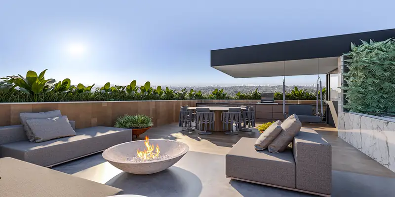 Rooftop com lareira externa, lounge e mesa gourmet