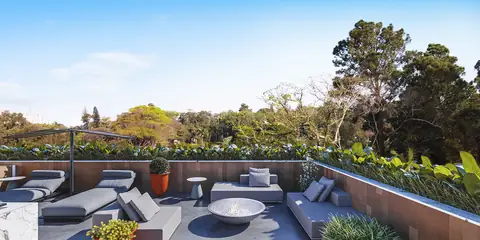 Deck do rooftop com vista para a área verde